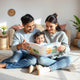 Child and parent sharing an open picture book with colorful interactive pages in a cozy living room