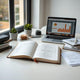 Clean desk with notebook and abstract charts, suggesting structured planning for business decisions