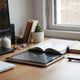 Tablet displaying an interactive flipbook with smoothly turning pages on a clean desk scene