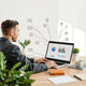 Person reviewing an automated workflow dashboard with connected icons for email, invoices, scheduling, and support