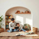 Parent and child reading together in a cozy nook with an ebook displayed on a tablet