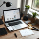 Clean marketing workspace with laptop workflow planning and editing tools to boost content efficiency